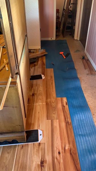 laying new hardwood flooring