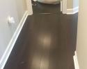 Dark brown LVT flooring installation