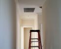 Crown molding installation in hallway