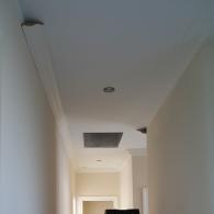 Crown molding installation in hallway