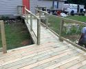 Deck with wheelchair ramp