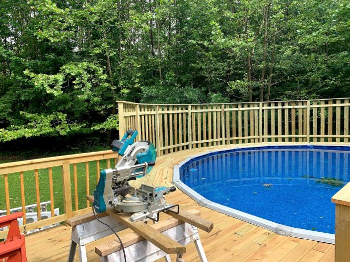 Pool deck with tall railing