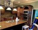 Dark stained kitchen cabinets