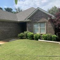 Freshly pressure washed brick home