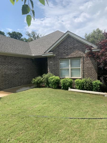 Freshly pressure washed brick home